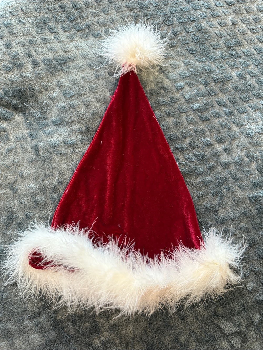 Festive Red Velvet Santa Hat with White Feather Trim